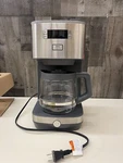 Ge 12-CUP Drip Coffee Maker Glass Carafe Programmable Stainless Steel Silver. Fixed Price $70.00.