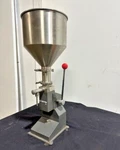 "kimtem" Manual Paste Liquid Filling Machine Adjustable Bottle Filler. Fixed Price $104.39.