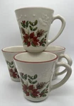 Longaberger Natures Garland Christmas Mugs Poinsettia Microwave Safe 4 Count. Fixed Price $46.99.