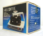 Mr Coffee Cup Decanter & Electric Warmer Plate In Box Tested Model WD-10. Fixed Price $17.00.