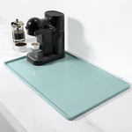12"X19" Shadow Green Silicone Coffee Mat With Raised Edge Heat Resistant. Fixed Price $19.99.