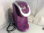 Keurig Single Serve Coffee Maker Model K2.0-200 Purple With Cup Storage. Fixed Price $29.00.